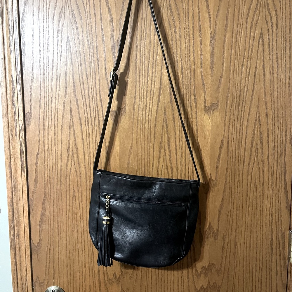 Black Leather Tinganello purse. Very clean and in great condition!